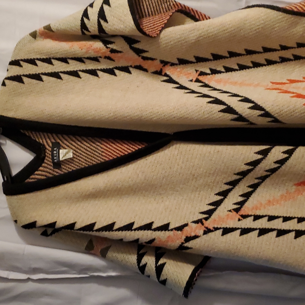 Akira asymmetrical poncho